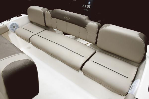 Slide: The Image of 2024 Key West 189 FS boat interior seating with beige cushions. - 49