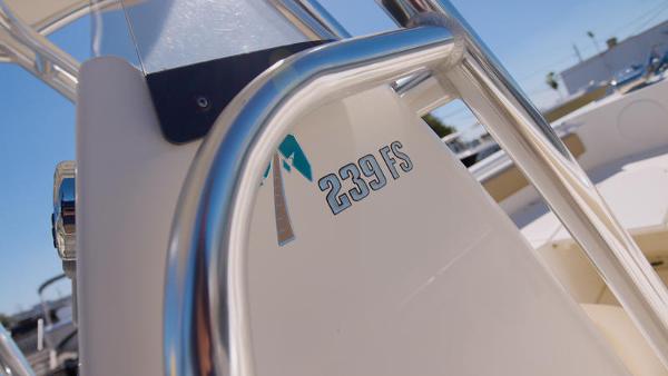 Slide: The Image of 2018 Key West 239FS boat close-up with stainless steel railing. - 7