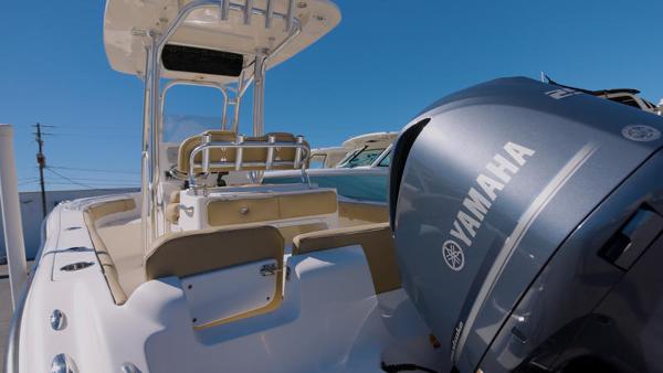 Slide: The Image of 2018 Key West 239FS boat with Yamaha engine, rear view. - 8