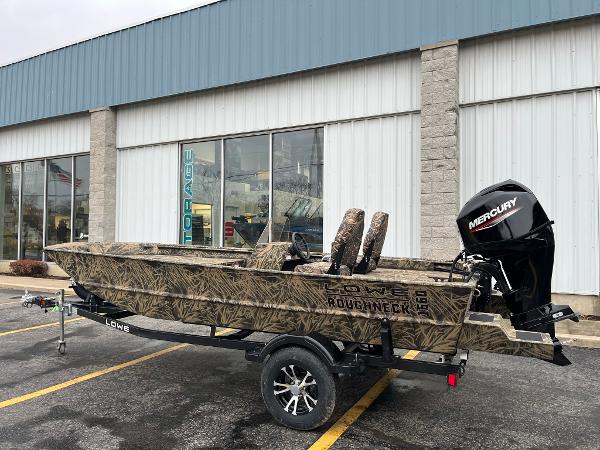 Slide: The Image of 2024 Lowe Roughneck RX1660 SC boat with Mercury engine on trailer. - 1