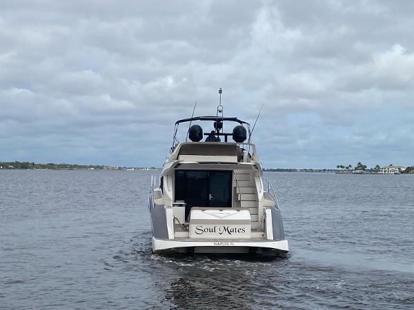 Slide: The Image of 2017 Marquis 500 Sport Yacht Soul Mates cruising on a cloudy day. - 5