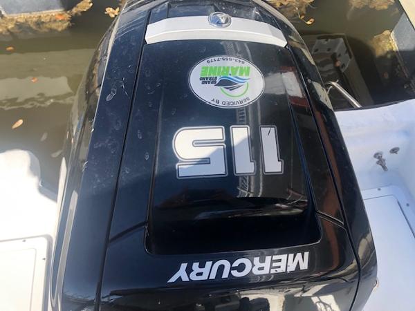 Slide: The Image of Mercury 115 outboard motor on a 2021 May-Craft 1800 Skiff boat. - 11