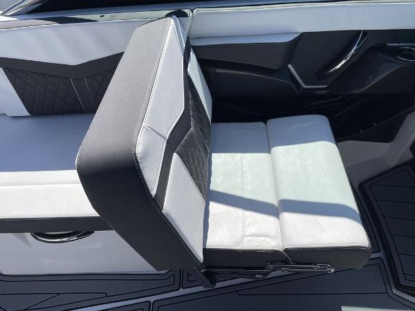 Slide: The Image of 2023 Monterey 278SS boat interior with adjustable seating and modern design. - 11
