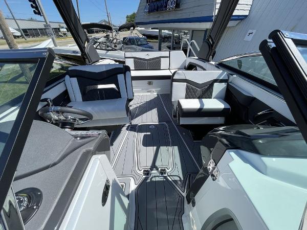 Slide: The Image of 2023 Monterey 278SS boat interior with modern seating and sleek design. - 9