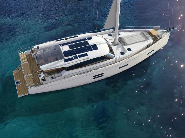 Slide: The Image of 2024 Moody 48 Deck Saloon yacht sailing on clear blue water. - 1