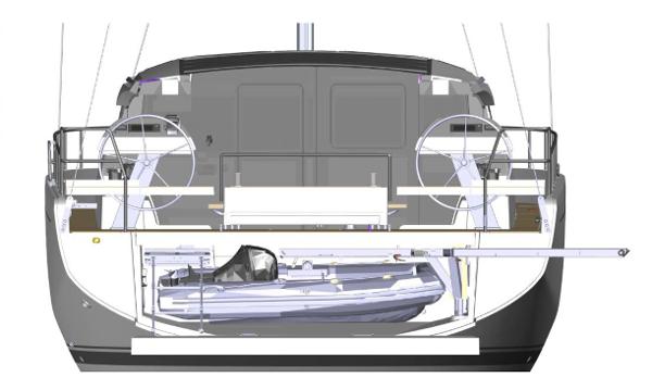 Slide: The Image of 2024 Moody 48 Deck Saloon yacht rear view with dual steering wheels and dinghy storage. - 25