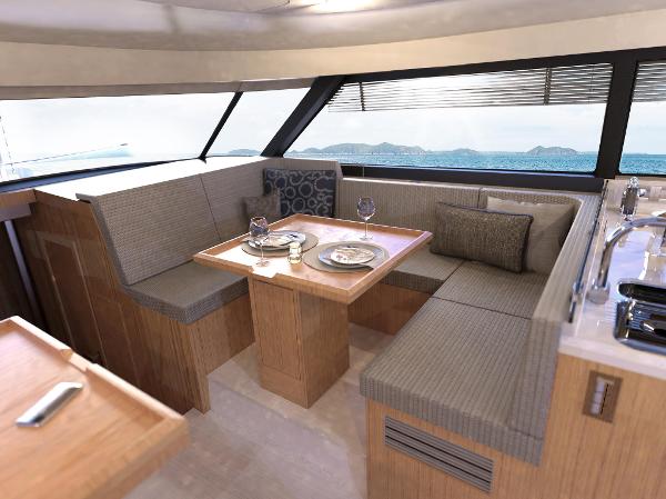 Slide: The Image of Modern interior of 2024 Moody 48 deck saloon with dining area and ocean view. - 9