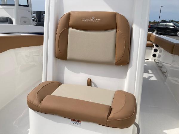 Slide: The Image of 2023 NauticStar 24 Legacy boat seat with tan and beige upholstery. - 11