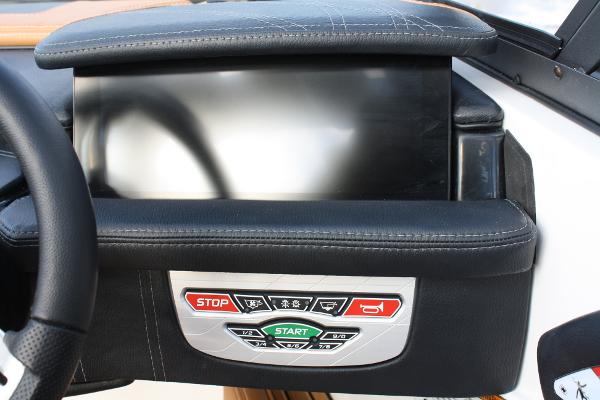 Slide: The Image of Dashboard of 2017 Nautique Super Air G23 boat with control buttons and display. - 29