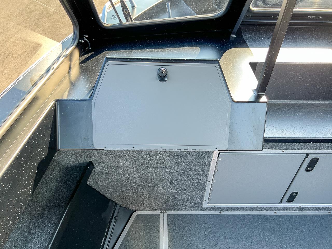 Slide: The Image of Interior of 2024 North River 21 SEAHAWK boat, featuring storage compartments and sleek design. - 12