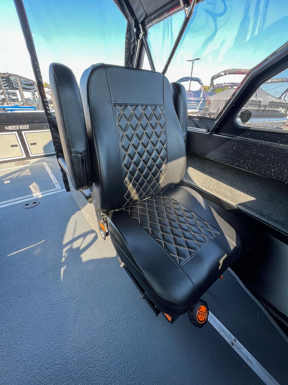 Slide: The Image of 2024 North River 21 SEAHAWK interior with black diamond-stitched seat. - 14