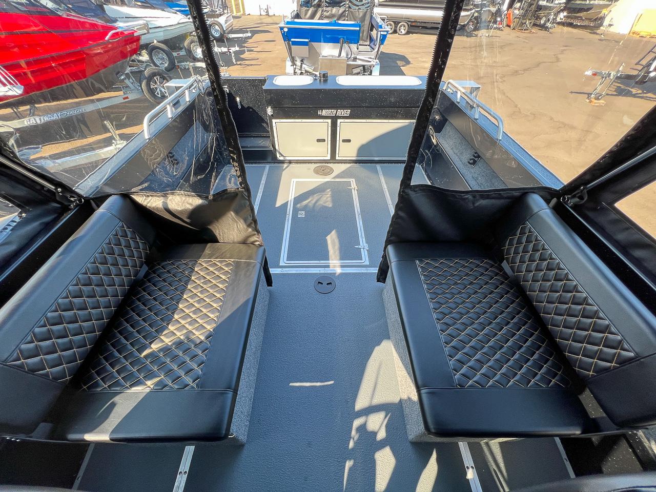 Slide: The Image of Interior of 2024 North River 21 SEAHAWK boat with black diamond-stitched seating. - 15