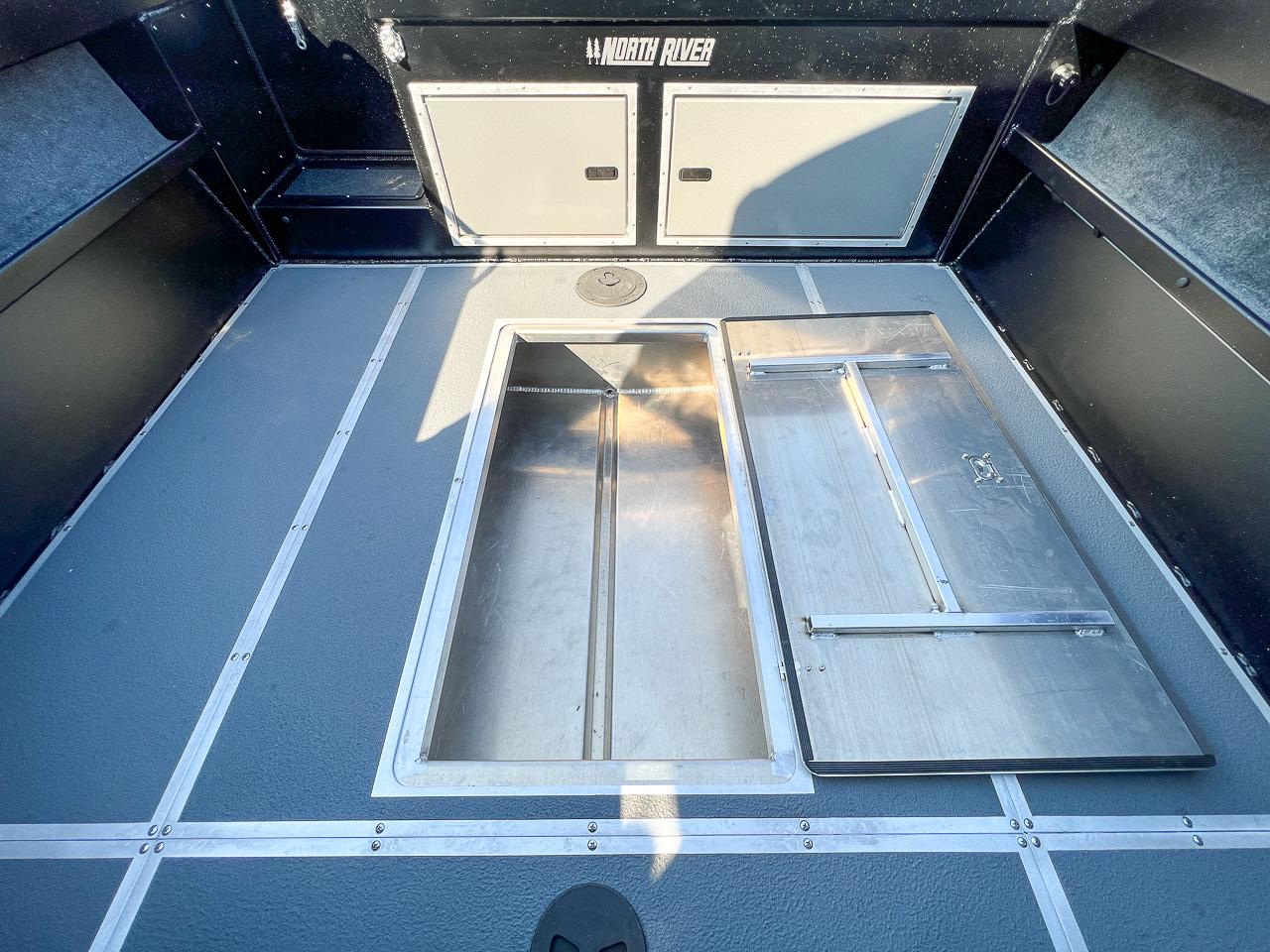 Slide: The Image of 2024 North River 21 SEAHAWK boat interior with storage compartments. - 19