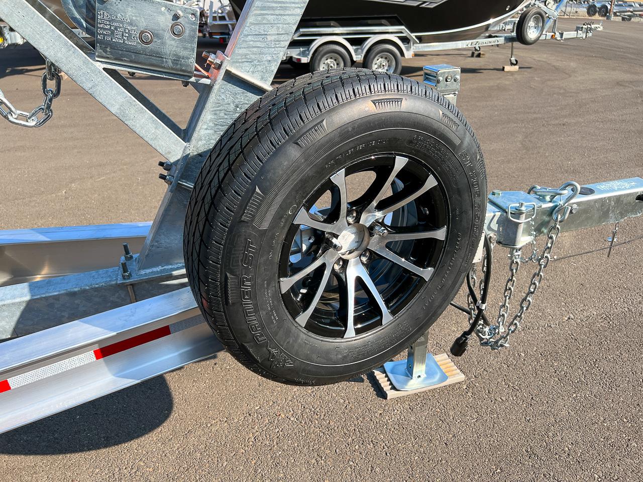 Slide: The Image of 2024 North River 21 SEAHAWK trailer with spare tire and hitch. - 24