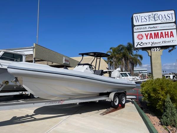 Slide: The Image of 2024 Northstar Orion 8 boat on trailer at West Coast Marine dealership. - 1