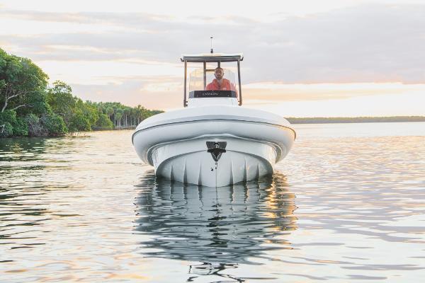 Slide: The Image of 2024 Northstar Orion 8 boat on calm water at sunset. - 5