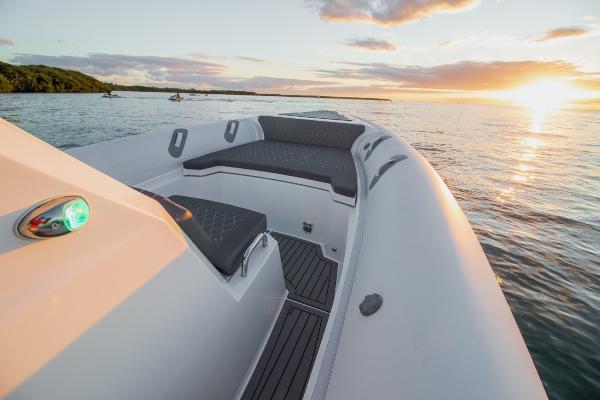 Slide: The Image of 2024 Northstar Orion 8 boat at sunset on calm waters. - 6