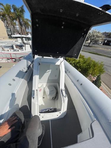 Slide: The Image of 2024 Northstar Orion 8 boat with open storage compartment. - 7