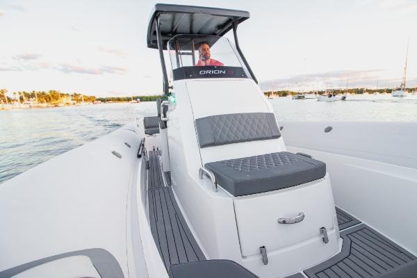 Slide: The Image of 2024 Northstar Orion 8 boat on water, featuring sleek design and comfortable seating. - 8