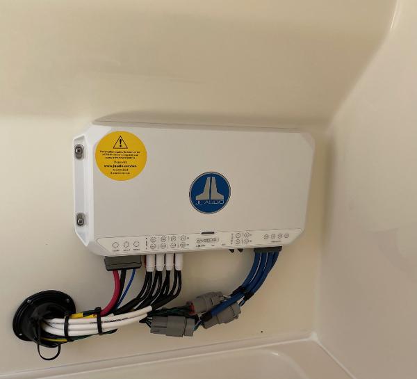 Slide: The Image of JL Audio system in 2024 Pathfinder 2400 Open boat, featuring connected wiring. - 17