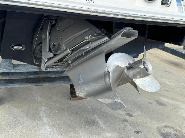 Slide: The Image of Close-up of the propeller and stern drive of a 2016 Regal 22 FasDeck ESX boat. - 10