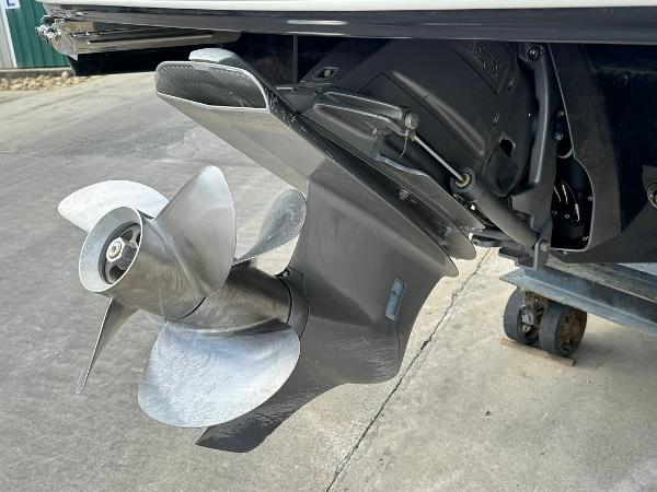 Slide: The Image of 2016 Regal 22 FasDeck ESX boat propeller and stern drive close-up. - 11