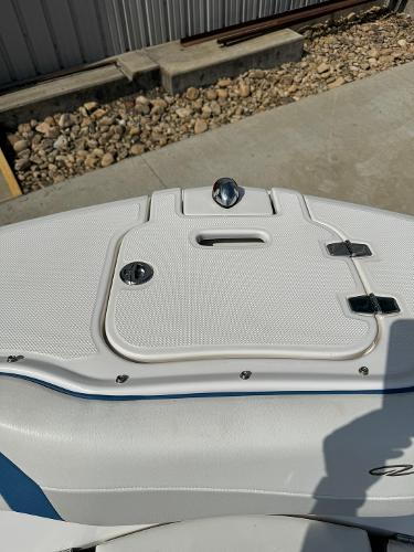 Slide: The Image of 2016 Regal 22 FasDeck ESX boat deck with storage compartment. - 37