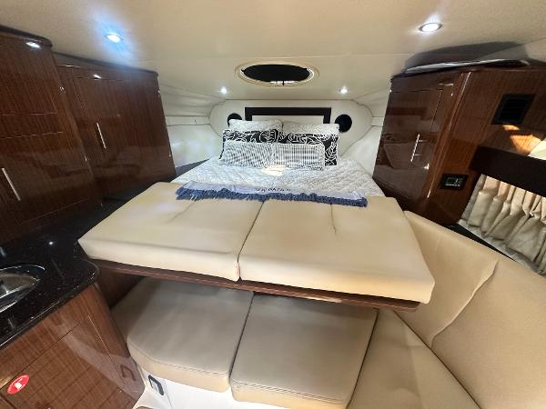 Slide: The Image of Luxurious interior of 2014 Regal 32 Express yacht with cozy bed and seating area. - 22