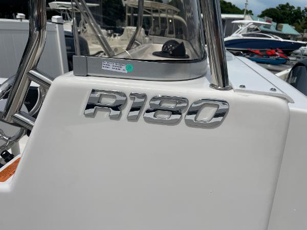 Slide: The Image of 2023 Robalo R180 Center Console boat, close-up of model emblem. - 14