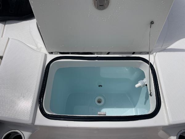 Slide: The Image of Livewell compartment on 2023 Robalo R180 Center Console boat. - 20