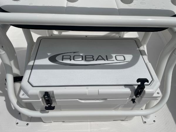 Slide: The Image of 2023 Robalo R180 Center Console boat cooler with logo. - 23