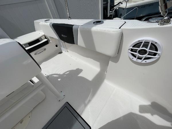 Slide: The Image of 2023 Robalo R180 Center Console boat interior with seating and speaker. - 28