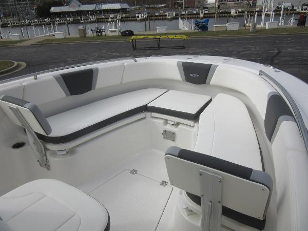 Slide: The Image of 2024 Robalo R250 Center Console boat with spacious seating area. - 16