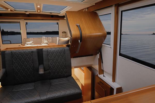Slide: The Image of Interior of 2025 Sargo 45 Cat A boat with elegant seating and dining area. - 26