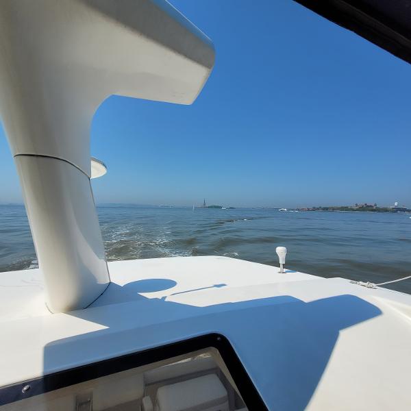 Slide: The Image of View from a 2000 Silverton 392 Motor Yacht on open water. - 6