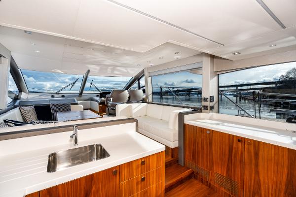 Slide: The Image of Luxurious interior of 2017 Sunseeker Manhattan 52 yacht with modern kitchen and seating area. - 14