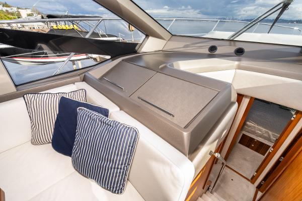 Slide: The Image of Interior of 2017 Sunseeker Manhattan 52 yacht with striped cushions and panoramic windows. - 23
