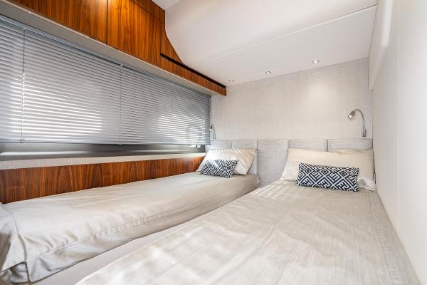 Slide: The Image of 2017 Sunseeker Manhattan 52 twin bed cabin with modern decor and wood accents. - 42