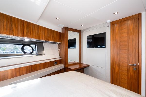 Slide: The Image of Luxurious bedroom interior of 2017 Sunseeker Manhattan 52 yacht with wood paneling. - 47