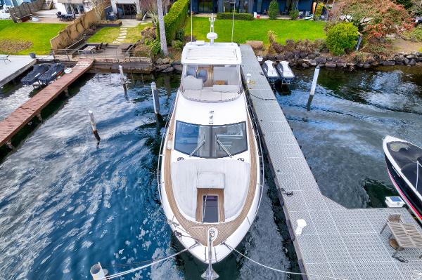 Slide: The Image of 2017 Sunseeker Manhattan 52 yacht docked at a marina, aerial view. - 5