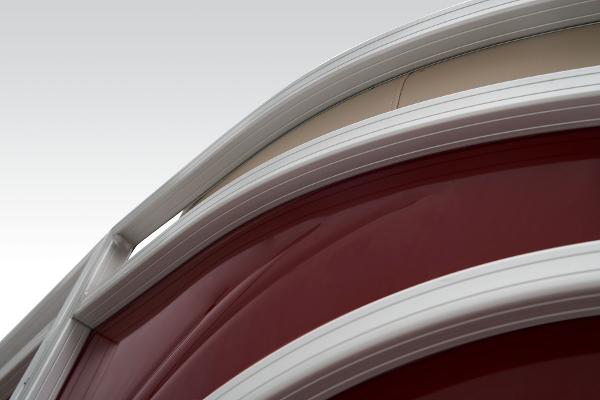 Slide: The Image of Close-up of 2024 Sun Tracker Party Barge 20 DLX red exterior detailing. - 18