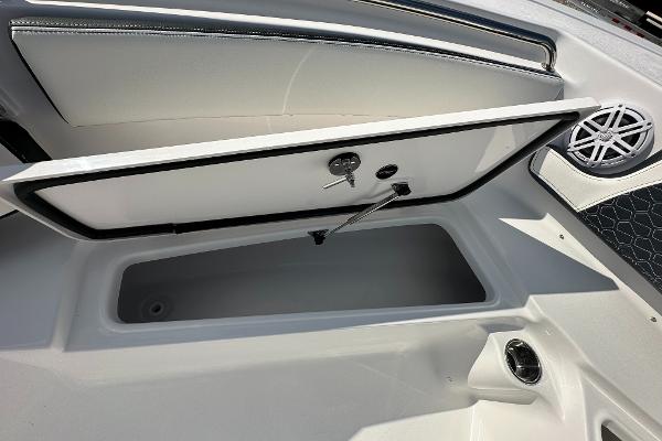 Slide: The Image of Open storage compartment on 2024 Tidewater 210 CC Adventure boat. - 16