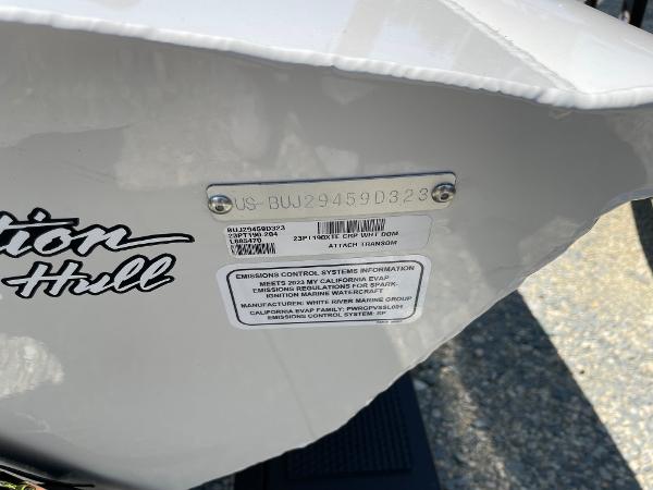 Slide: The Image of 2023 Tracker Pro Team 190 TX boat hull identification number and emissions control label. - 16