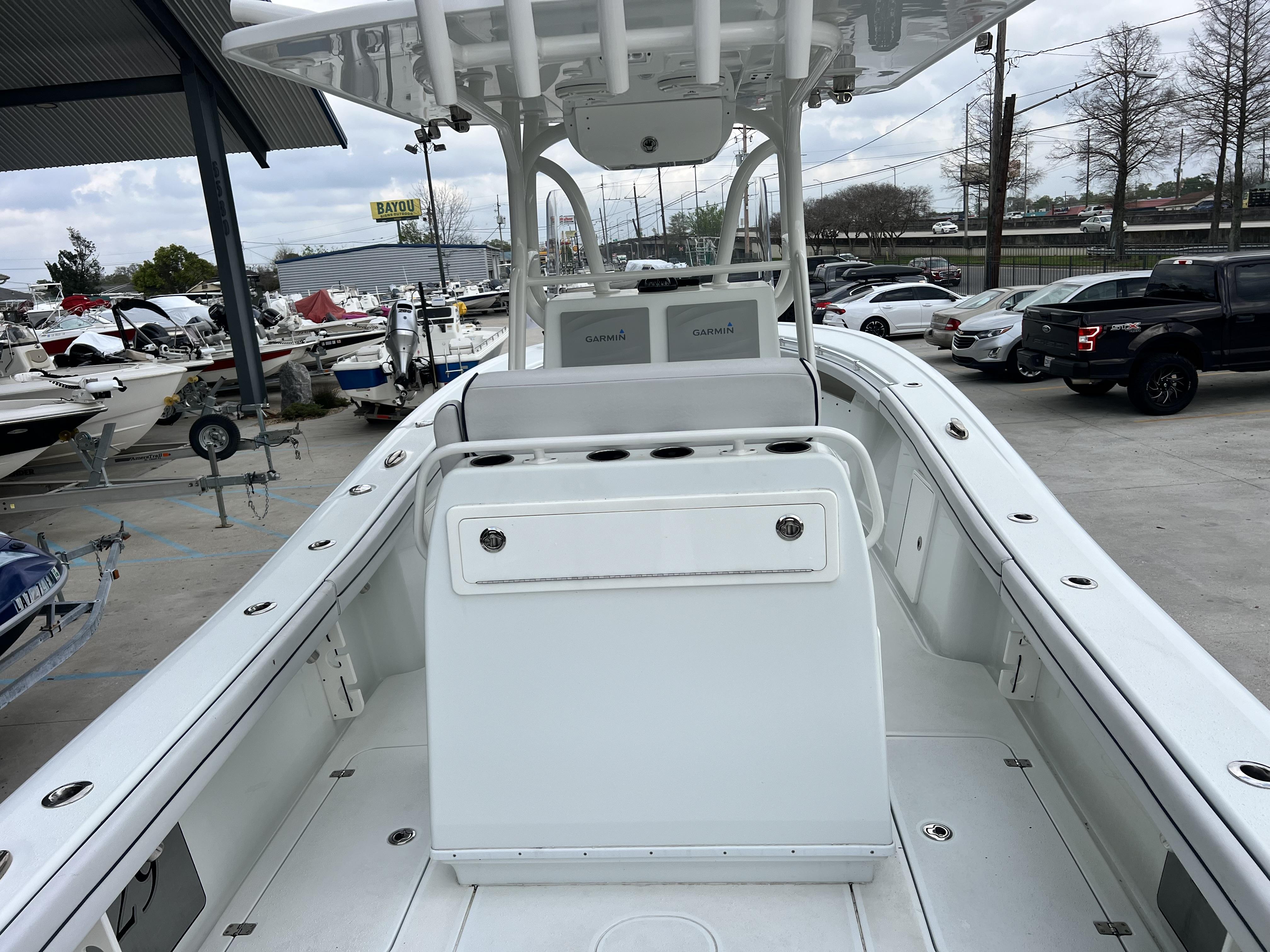 Slide: The Image of 2018 Yellowfin 29 boat on display at a dealership. - 22